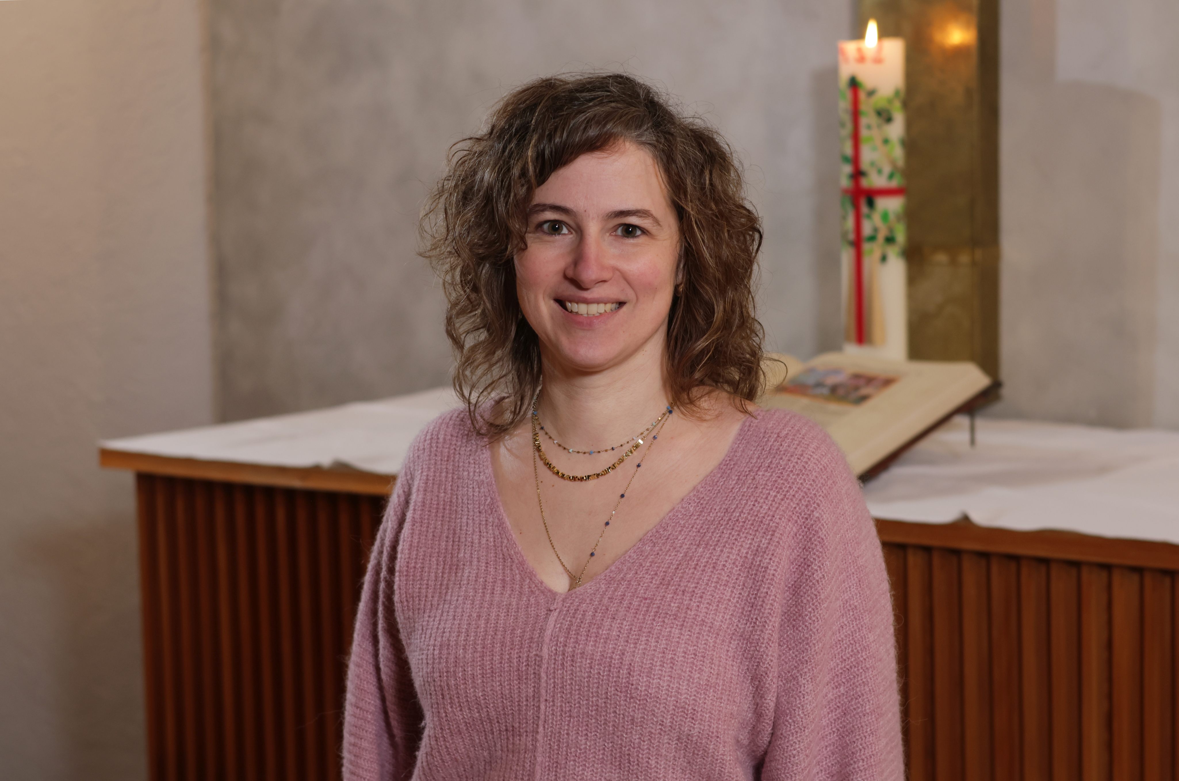 A flat style illustration of a womans avatar.