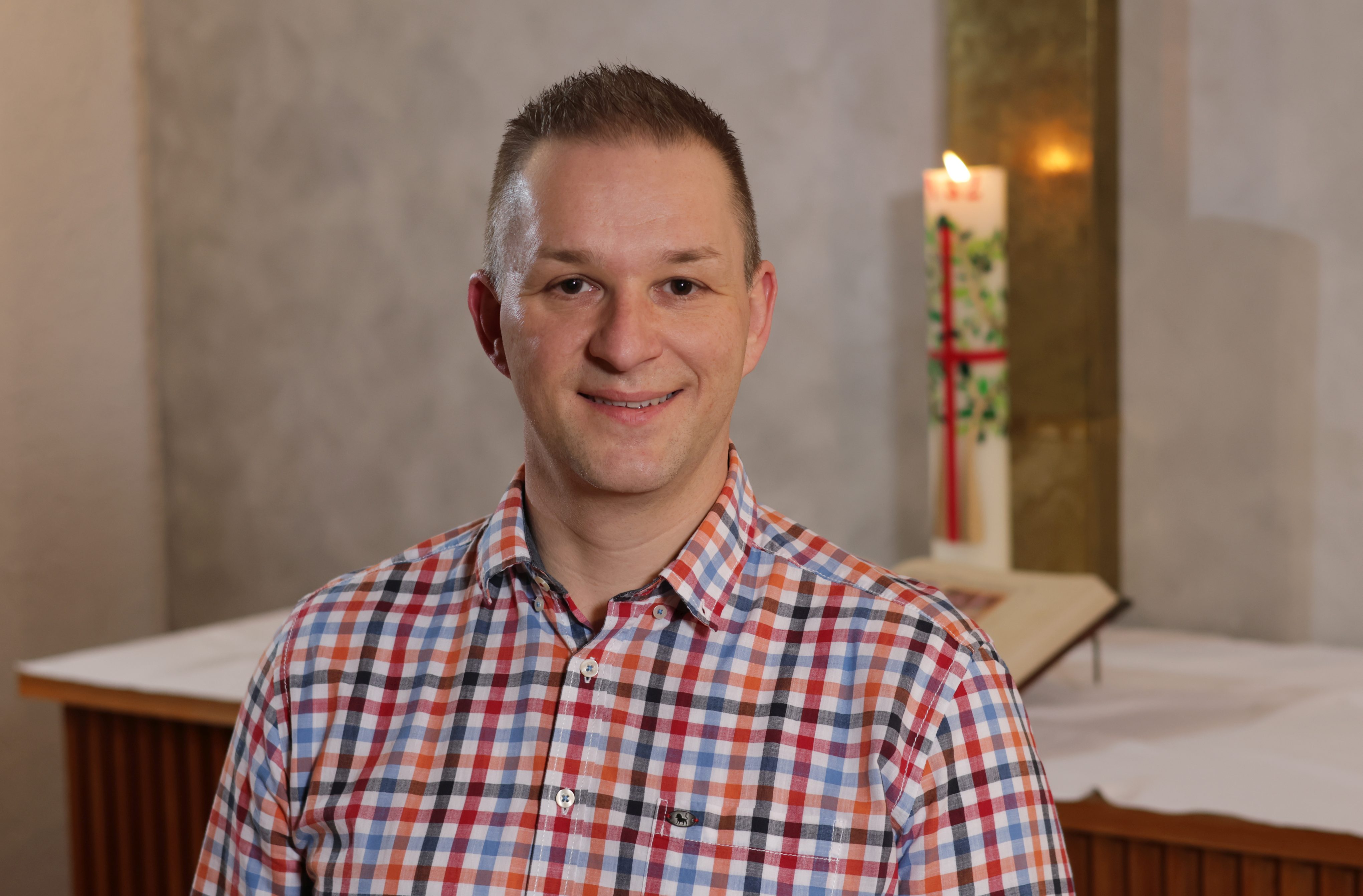 A simplistic illustration of a mans face in a flat, two-dimensional style.