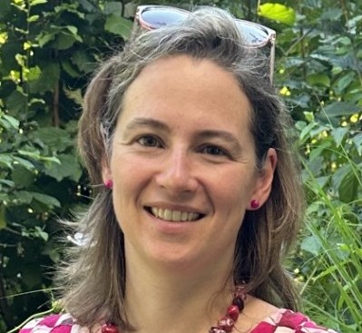 A flat style illustration of a womans avatar.